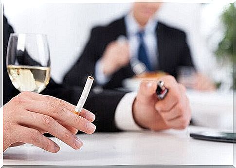 Men in suits with wine and cigarettes, which are bad habits.