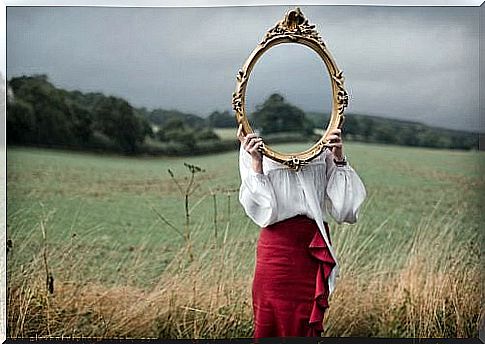 Woman behind mirror