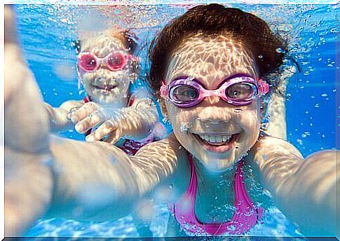 Two children under water.