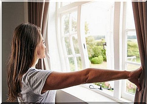 Woman lets in fresh air