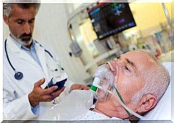 A patient receiving oxygen through a mask.