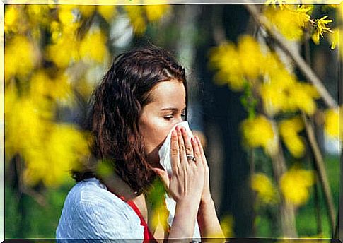 Woman suffering from seasonal allergies.