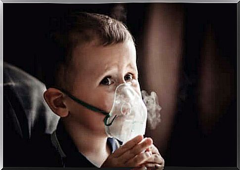 A child with an oxygen mask on