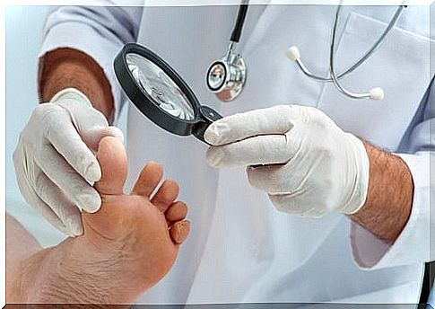 Doctor checks foot