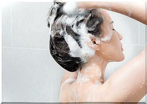 A woman washing her hair.